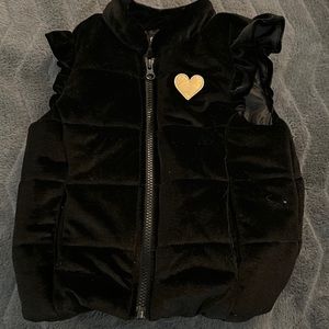 Black puffer vest
